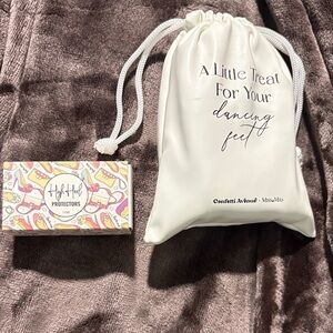 White Drawstring Bag with flats inside & High Heel Protectors